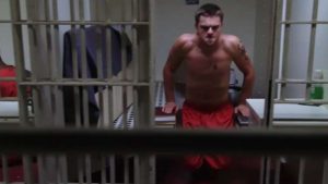 Actor Leonardo Di Caprio shirtless in a prison cell for The Deprted
